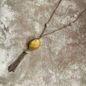 Yellow crystal costume jewelry with tassel